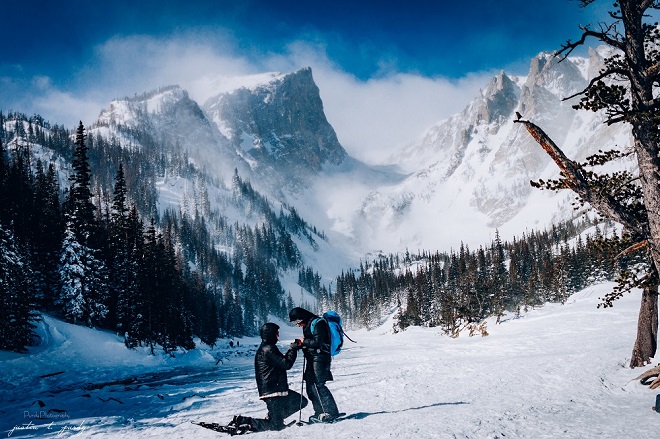 mountain proposal scene, proposing on skis