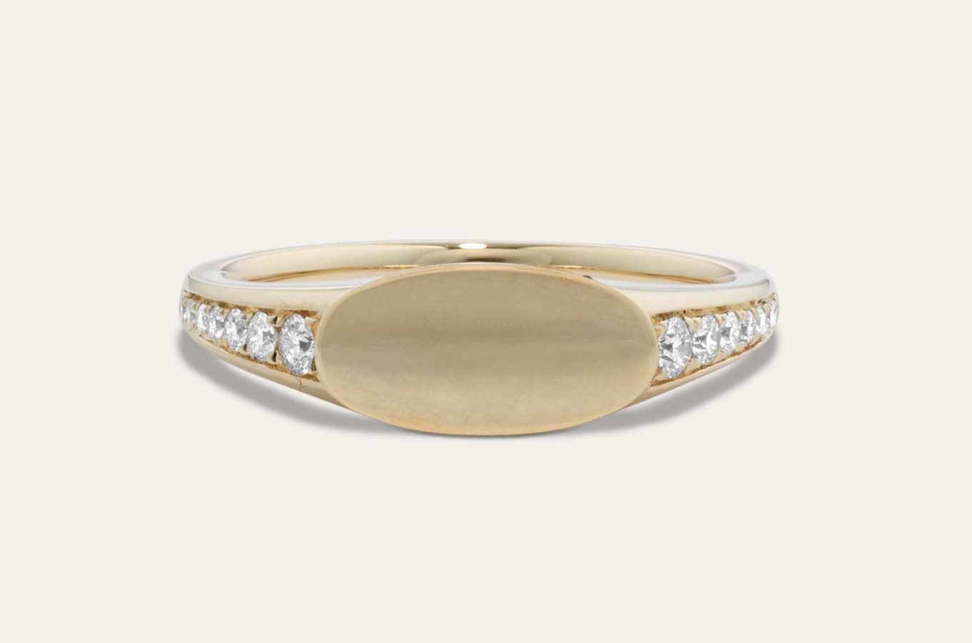 Pave Engravable Signet Ring Natural diamond pave increases in size as it reaches the center of this 14-karat yellow gold signet ring. Add a custom engraving on top for the perfect personal touch.