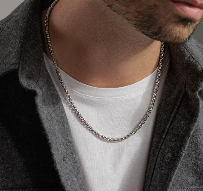 white gold chain necklace on man