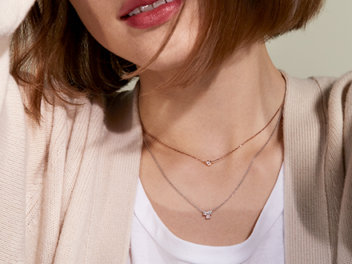 Layered Solitaire Necklace and Diamond Cluster Close Up