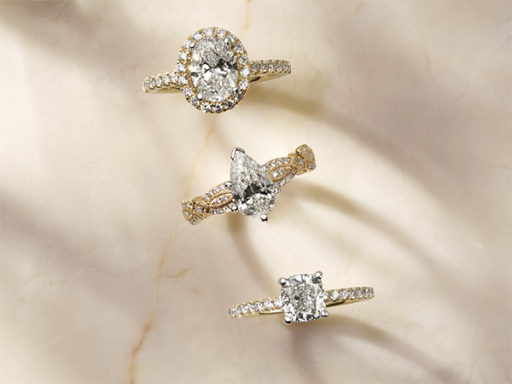 Three Diamond Engagement Rings in Yellow Gold