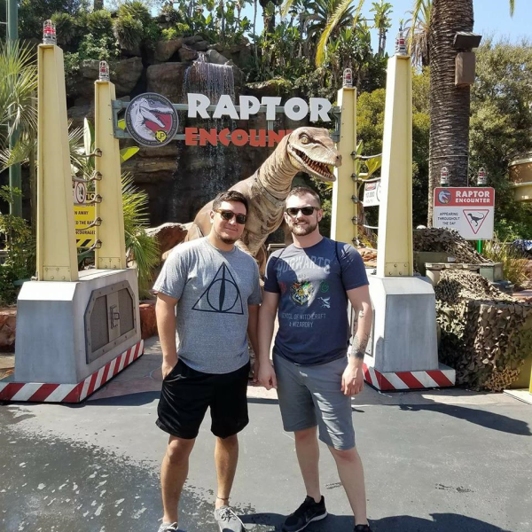 Andrew and Brian at an amusement park.