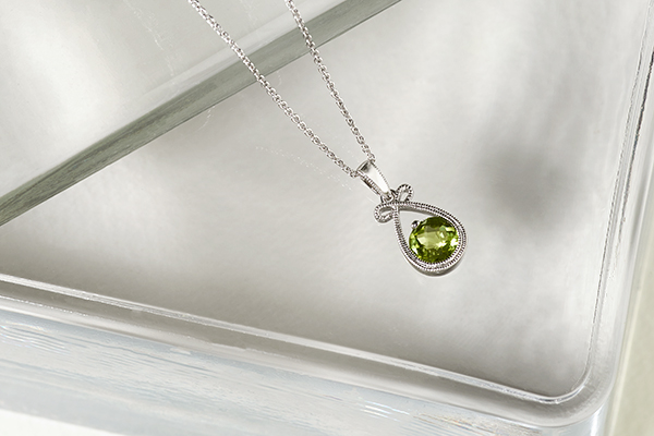 Peridot pendant necklace close-up.