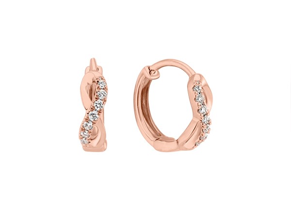 Rose gold diamond huggie earrings.