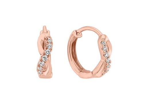 Rose gold diamond huggie hoop earrings.