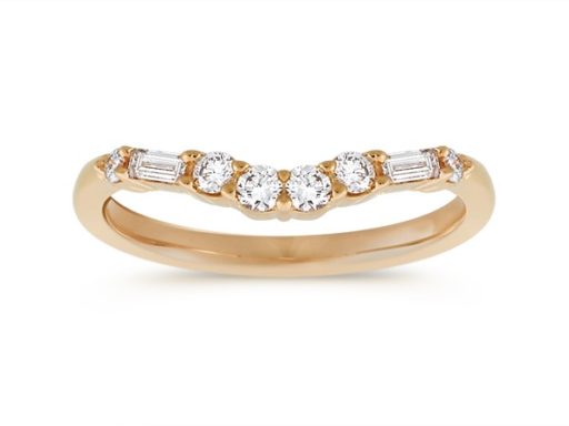 Round and baguette diamond contour wedding band.