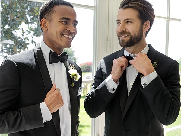 Groom getting ready with his groomsman.