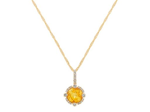 Round citrine and diamond pendant.