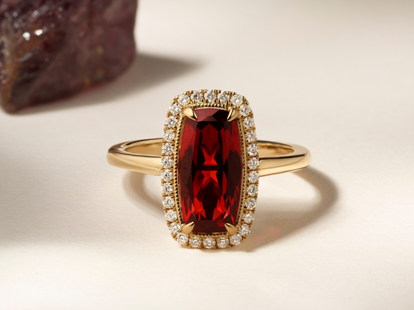 gold ring with ruby and diamond halo