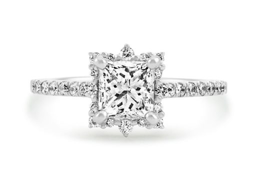 Pave-set diamond halo engagement ring