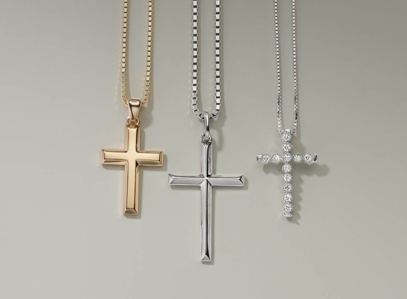 Matthias 14K Yellow Gold Cross Pendant This solid 14-karat yellow gold cross necklace makes a great gift or daily accessory. A matching box chain and secure lobster clasp offer worry-free wear. Anderson 24 in Cross Necklace in 14K White Gold Complete any look with this strong cross necklace. Added nickel, copper, zinc, and silver alloys in the 14-karat white gold create a bright and consistent shade that is sure to impress. The lobster clasp has a locking lever mechanism that will hold this pendant securely in place.Rebecca Diamond Cross Pendant This vintage-inspired cross pendant features natural diamonds with beautiful milgrain detailing throughout the design. It’s crafted in bright 14-karat white gold and comes on a matching box chain with a secure lobster clasp.