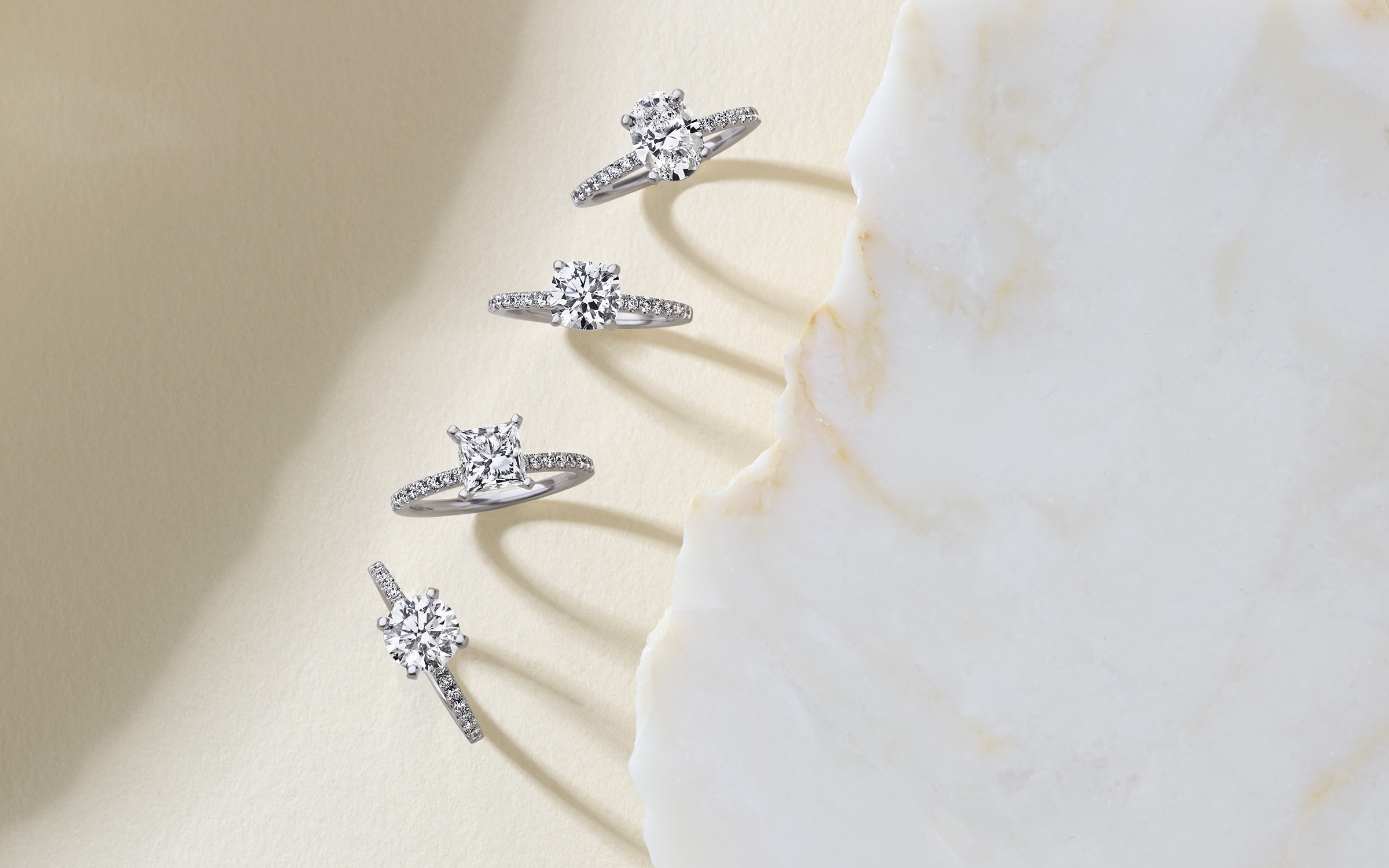Four diamond engagement rings.