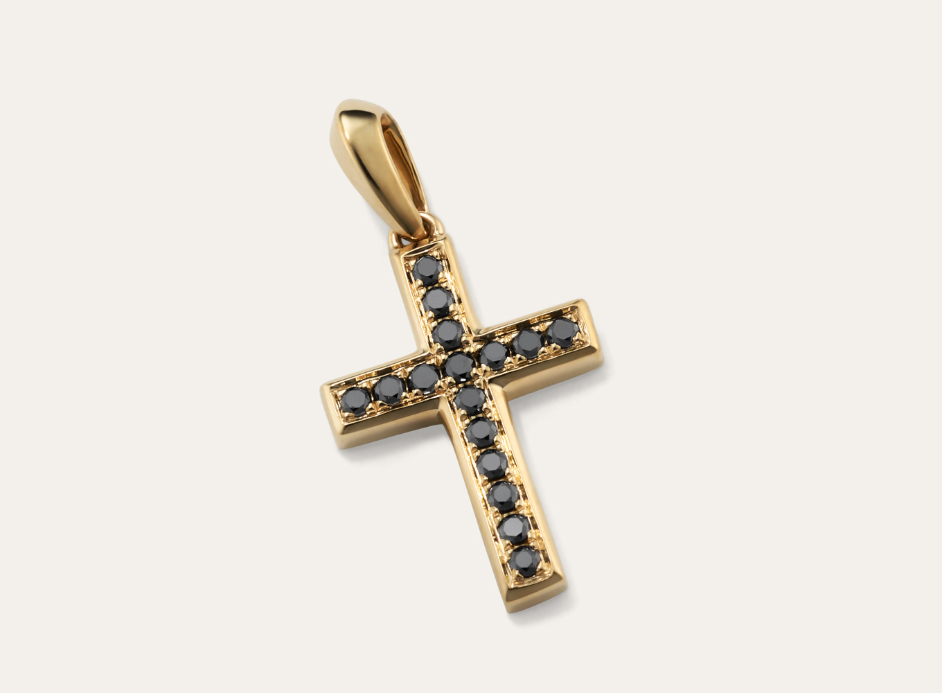 Crosby Black Diamond Cross Charm This bold 14-karat yellow gold cross charm features natural black diamonds, all hand matched for consistent color. Add a chain to turn this beautiful symbol of faith into a necklace.