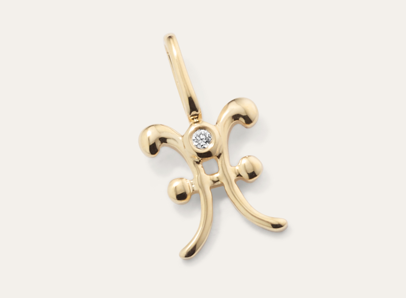 Pisces Sign Diamond Charm This 14-karat yellow gold zodiac charm, featuring the symbol for Pisces, makes a great gift or daily accessory. It has a natural diamond accent, offering a touch of sparkle. Add a chain to create a beautiful and meaningful necklace.