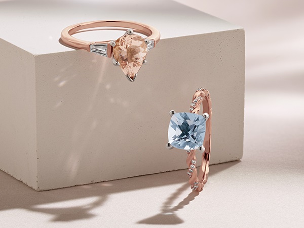 Rose gold aquamarine engagement ring with rose gold morganite engagement ring.