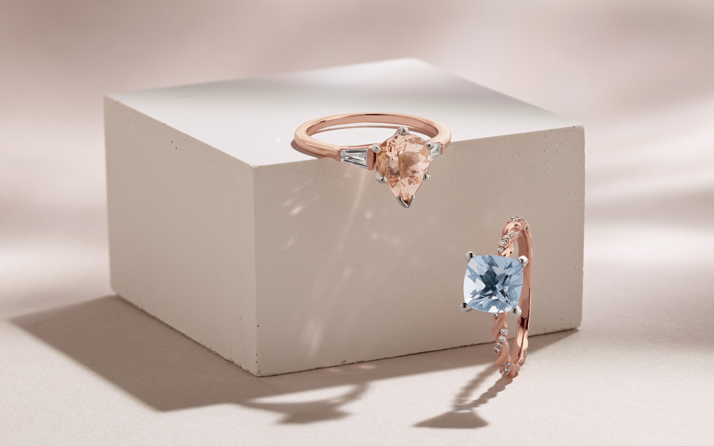 Morganite and diamond ring and an Aquamarine and diamond ring.