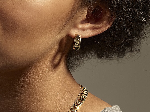 Up close shot of a gold earring