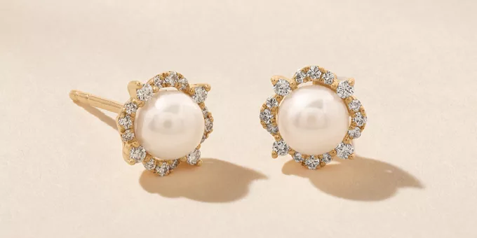 Yellow Gold Pearl Stud Earrings with diamond halo