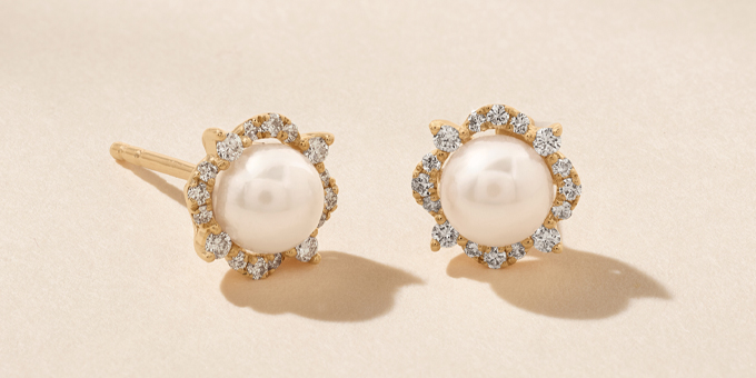 Yellow Gold Pearl Stud Earrings with diamond halo