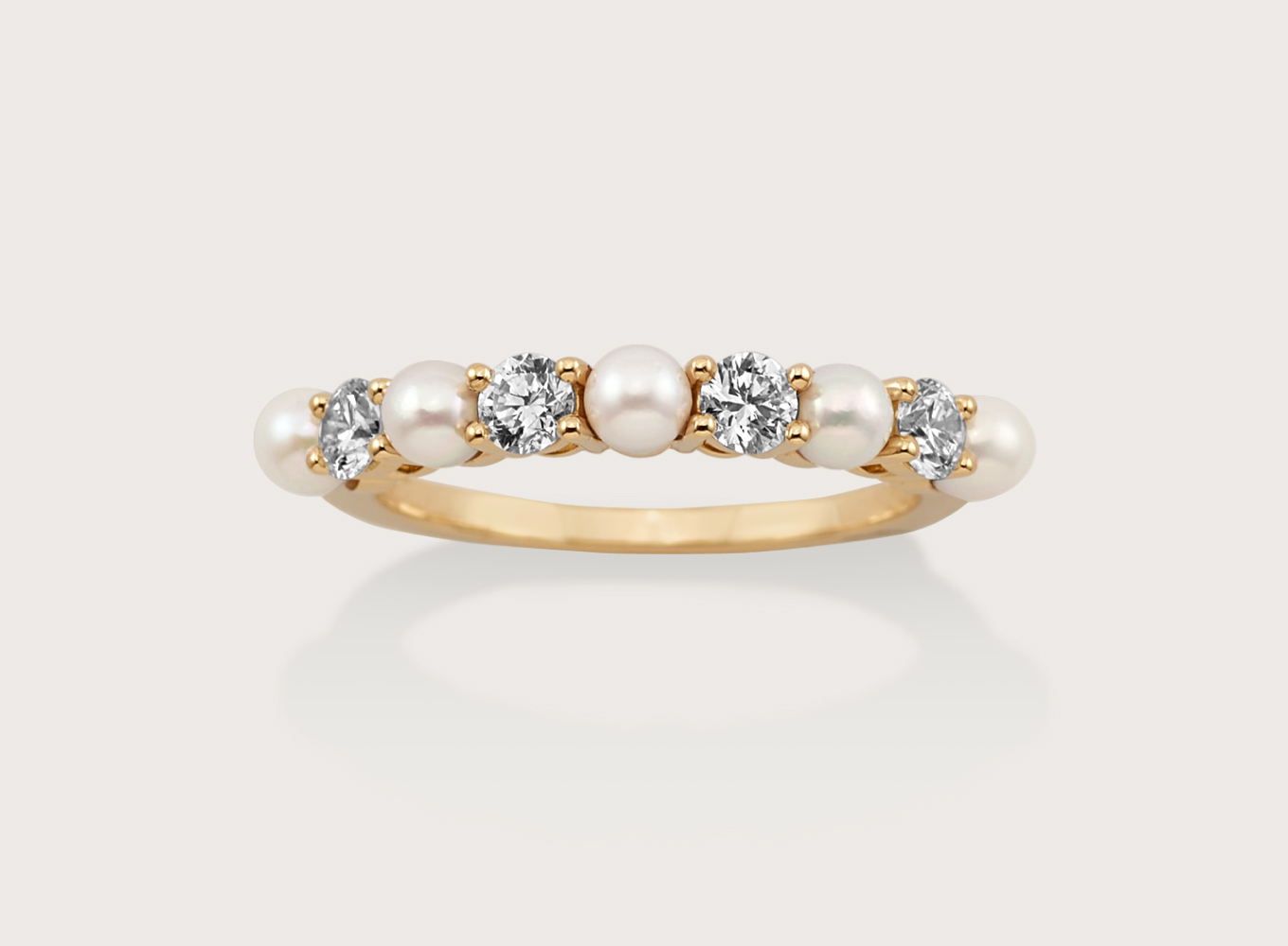 Annecy 3mm Cultured Akoya Pearl and Diamond Ring in 14K Yellow Gold
Dress to impress with this elegant pearl ring. All the cultured akoya pearls have been hand-matched for consistent color and size. The accenting natural diamonds are the hardest known gemstone on Earth and great for daily wear. You can personalize this ring with a custom engraving and/or finish thanks to the 14-karat yellow gold being malleable.