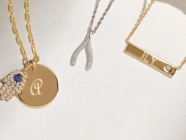 graduation gift ideas, pendant necklaces featuring a hand pendant, two engraved pendants, and a diamond pendant
