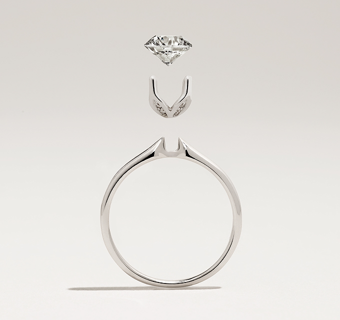 diamond engagement ring with halo ring enhancement in a component view