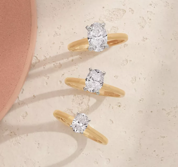 3 oval solitaire diamond rings highlighting the easy of upgrading the center stone at Shane Company