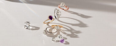 a variety of engagement rings, loose diamonds, and loose gemstones