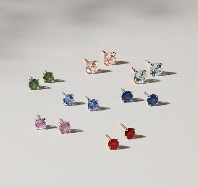 7 pair of colored gemstone stud earrings