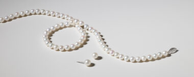 image of pearl necklace and pearl stud earrings. 6mm Freshwater Cultured Pearl Strand and 7mm Cultured Freshwater Pearl Studs