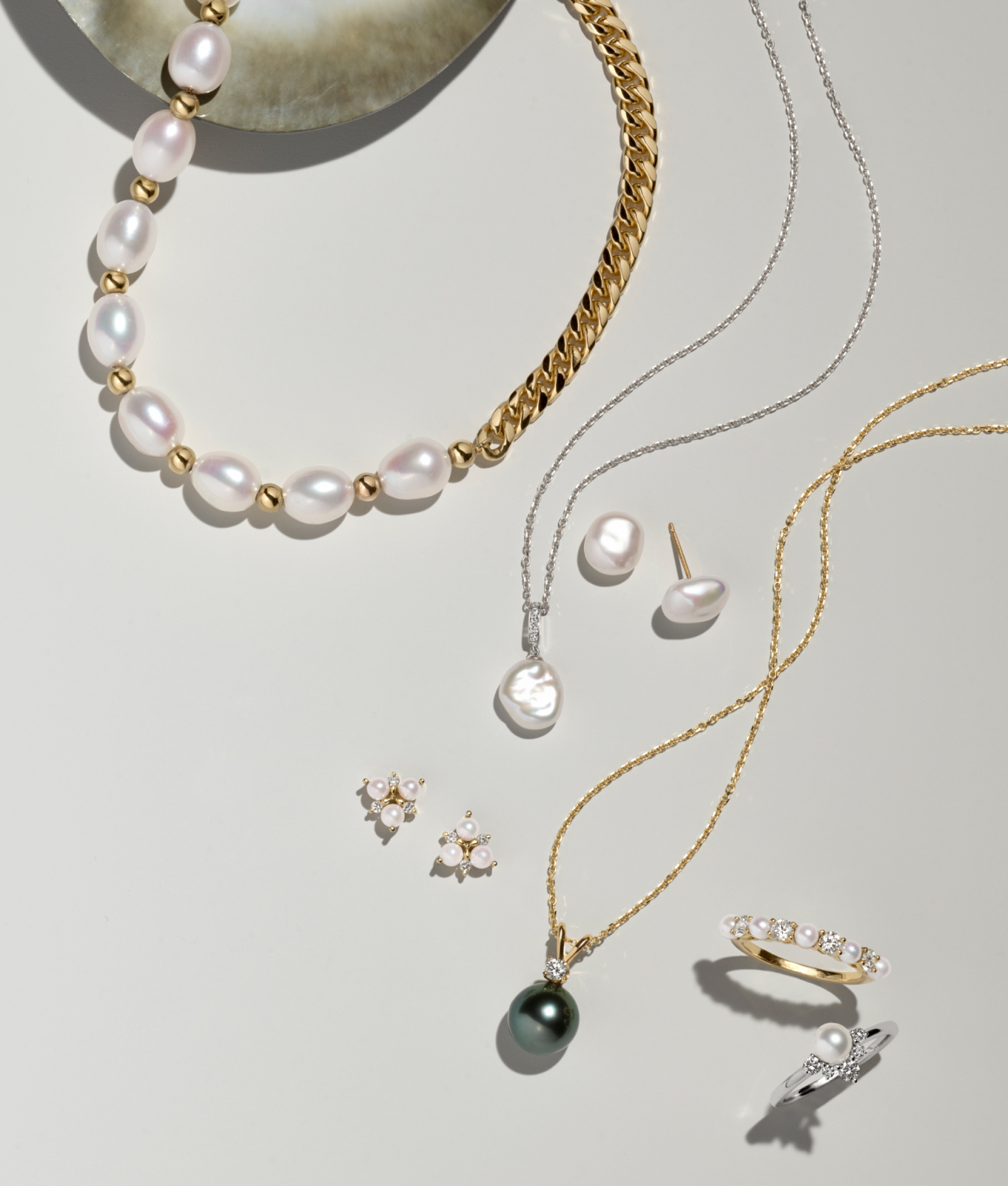 Damaris 8mm Cultured Freshwater Pearl Necklace in Vermeil 14K Yellow Gold, Inara 7mm Cultured Freshwater Keshi Pearl Earrings in 14K Yellow Gold, Nahla 8mm Cultured Freshwater Keshi Pearl and Diamond Pendant in 14k White Gold, Tallulah 3mm Cultured Freshwater Pearl and Diamond Earrings in 14K Yellow Gold, Ayla 9mm Tahitian Pearl & Diamond Pendant, Annecy 3mm Cultured Akoya Pearl and Diamond Ring in 14K Yellow Gold, Vivi 5mm Cultured Freshwater Pearl and Diamond Chevron Ring