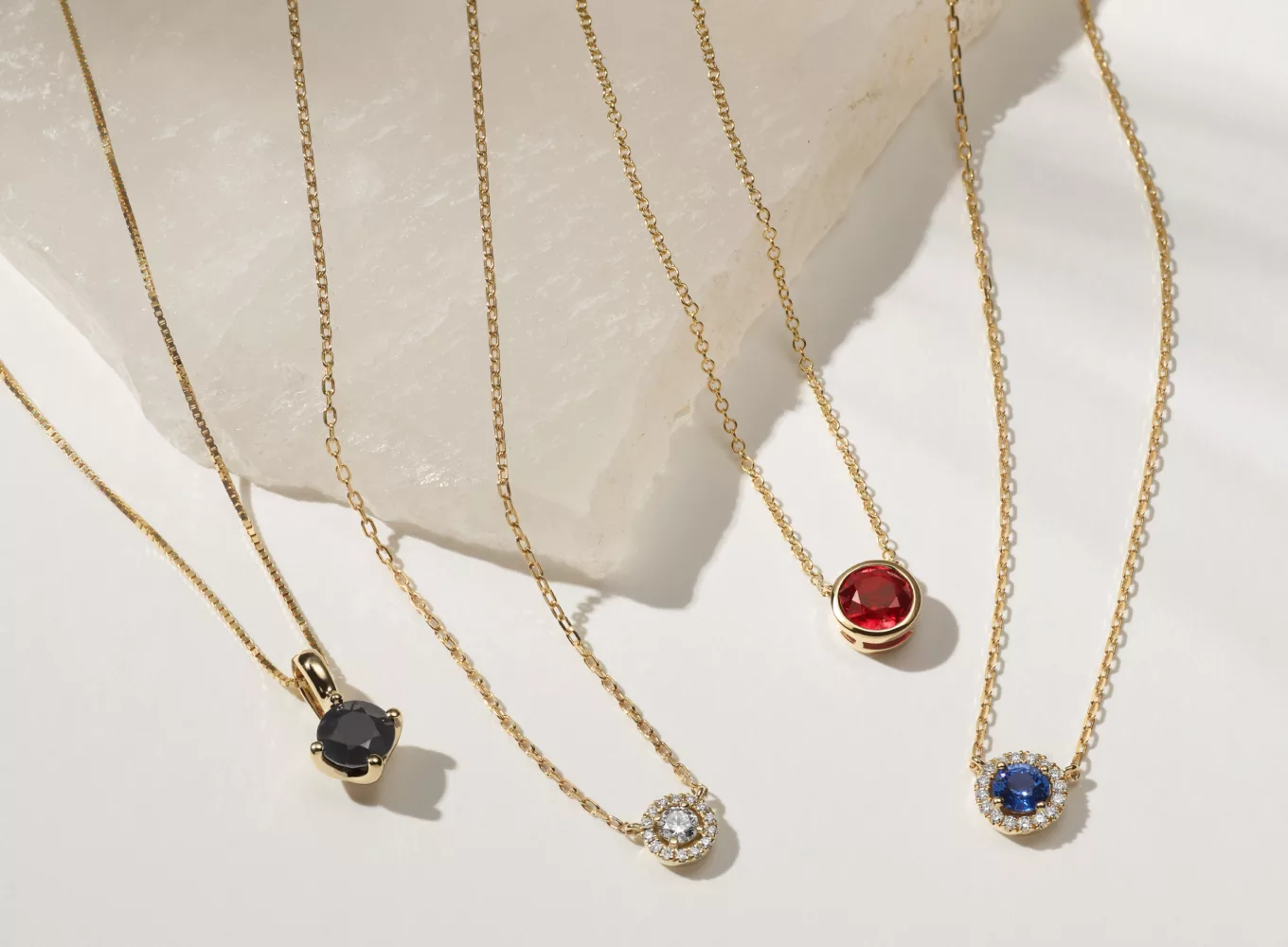 gemstone pendant necklaces: diamond, ruby, sapphire