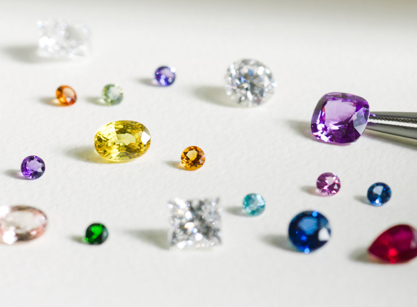 assorted loose diamonds and gemstones