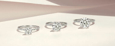 three diamond engagement rings with center stone getting progressively larger highlighting the Shane Co. upgrade policy