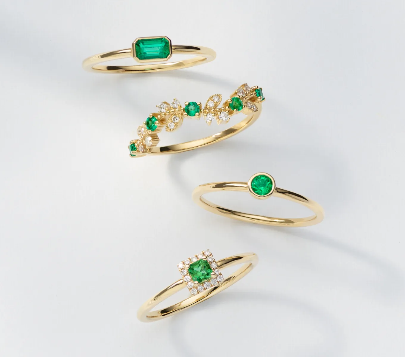 Zelena Bezel-Set Emerald Ring A natural emerald is the star of this beautiful bezel-set ring. A classic emerald cut showcases the emerald’s vibrant green color, while warm 14-karat yellow gold makes the perfect complement. Wear this ring alone, or stack it with favorites. To care for natural emeralds, gently clean with mild soapy water and a soft cloth. Avoid harsh chemicals, ultrasonic jewelry cleaners, and extreme temperature changes. Bryony Emerald & Diamond Ring Natural diamonds and emeralds decorate the beautiful vine-like design of this 14-karat yellow gold ring. It features delicate milgrain detail for a vintage-inspired touch. To care for natural emeralds, gently clean with mild soapy water and a soft cloth. Avoid harsh chemicals, ultrasonic jewelry cleaners, and extreme temperature changes. Elowen Bezel-Set Emerald Ring Add a petite pop of color to any look with this natural emerald ring. Crafted in warm 14-karat yellow gold, it features a stylish bezel setting. Wear it solo, or add it to your favorite ring stack. To care for natural emeralds, gently clean with mild soapy water and a soft cloth. Avoid harsh chemicals, ultrasonic jewelry cleaners, and extreme temperature changes. Quadra Emerald & Diamond Halo Ring A halo of natural diamonds complements the unique square shape of the natural emerald at the center of this ring. Crafted in warm 14-karat yellow gold, it’s beautiful on its own or stacked with a few of your favorites. To care for natural emeralds, gently clean with mild soapy water and a soft cloth. Avoid harsh chemicals, ultrasonic jewelry cleaners, and extreme temperature changes.