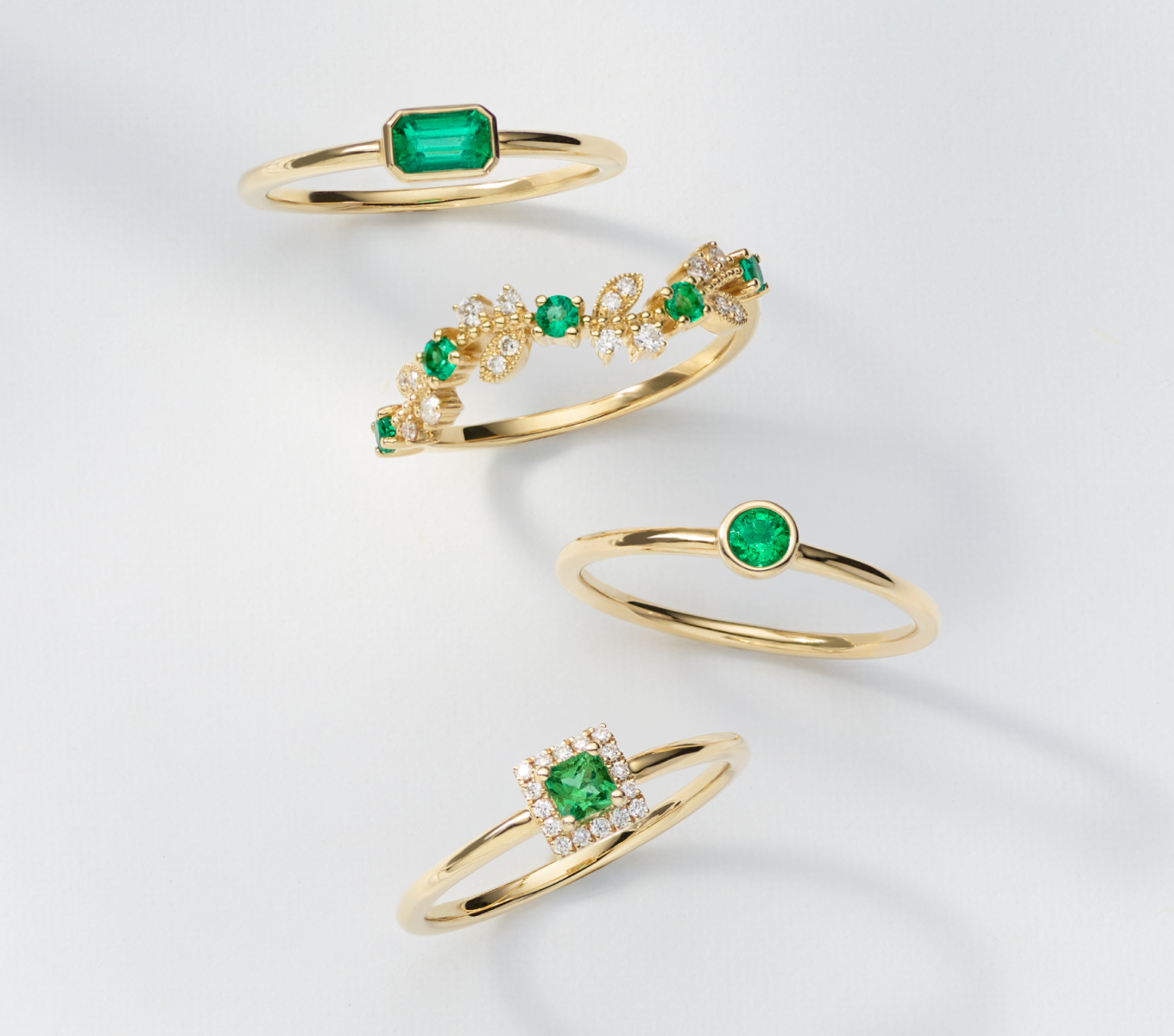 Zelena Bezel-Set Emerald Ring A natural emerald is the star of this beautiful bezel-set ring. A classic emerald cut showcases the emerald’s vibrant green color, while warm 14-karat yellow gold makes the perfect complement. Wear this ring alone, or stack it with favorites. To care for natural emeralds, gently clean with mild soapy water and a soft cloth. Avoid harsh chemicals, ultrasonic jewelry cleaners, and extreme temperature changes. Bryony Emerald & Diamond Ring Natural diamonds and emeralds decorate the beautiful vine-like design of this 14-karat yellow gold ring. It features delicate milgrain detail for a vintage-inspired touch. To care for natural emeralds, gently clean with mild soapy water and a soft cloth. Avoid harsh chemicals, ultrasonic jewelry cleaners, and extreme temperature changes. Elowen Bezel-Set Emerald Ring Add a petite pop of color to any look with this natural emerald ring. Crafted in warm 14-karat yellow gold, it features a stylish bezel setting. Wear it solo, or add it to your favorite ring stack. To care for natural emeralds, gently clean with mild soapy water and a soft cloth. Avoid harsh chemicals, ultrasonic jewelry cleaners, and extreme temperature changes. Quadra Emerald & Diamond Halo Ring A halo of natural diamonds complements the unique square shape of the natural emerald at the center of this ring. Crafted in warm 14-karat yellow gold, it’s beautiful on its own or stacked with a few of your favorites. To care for natural emeralds, gently clean with mild soapy water and a soft cloth. Avoid harsh chemicals, ultrasonic jewelry cleaners, and extreme temperature changes.
