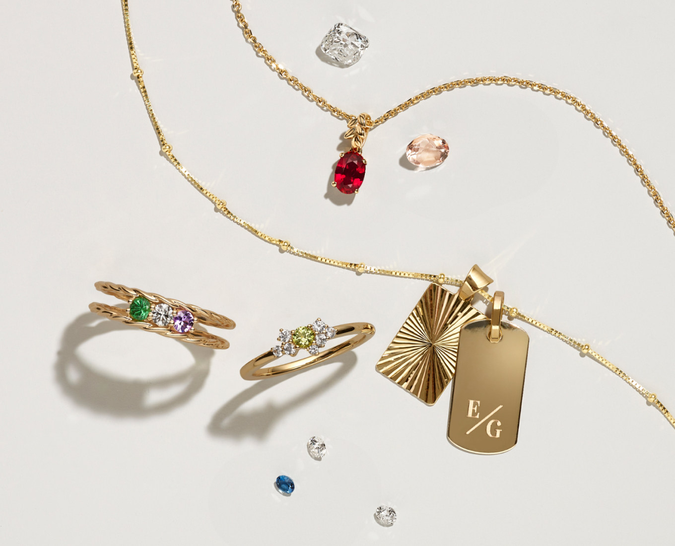 Swirl Ring in Yellow Gold Crafted in quality 14 karat yellow gold, this beautiful swirl design creates this Family Collection piece. Arrange up to 4 gemstones of your choice at approximately 3mm each to make the infinity ring uniquely yours. Begonia White Sapphire Ring for 3mm Gemstone in 14k Yellow Gold Crafted in quality 14 karat yellow gold, this beautiful ring measures 1.5mm wide, is completed with a high polish finish and awaits the center 3mm gemstone of your choice. For more information on selecting your center stone, Live Chat or call an online customer service representative at 1-866-467-4263, or visit one of our store locations. Pick-Your-Gem Classic Necklace (18 in) This lovely pendant is crafted from quality 14 karat yellow gold and has five round natural diamonds at approximately .03 carat total weight that will beautifully accent the 3.75 carat oval gemstone of your choice. This piece hangs from a matching 18-inch diamond cut cable chain measures 7/8 of an inch long and is secured with a lobster clasp. For more information on selecting your center stone Live Chat or call an online customer service representative at 1-866-467-4263 or visit one of our store locations. 20 in 14K Yellow Gold Satellite Box Chain (1mm) Add a touch of shine to any outfit with this stylish 14-karat yellow gold satellite box chain. Wear it alone or change up the look by adding a favorite charm or pendant. 14K Yellow Gold Fluted Charm Add fun texture and high shine to any outfit with this beautiful 14-karat yellow gold charm, featuring a fluted pattern to reflect more light. Create a chic necklace by adding a chain. 14K Yellow Gold Dog Tag Charm Personalize this 14-karat yellow gold dog tag charm with a custom engraving, or let it shine all on its own. This charm can accommodate either horizontal or vertical text. Create a beautiful necklace by adding a chain. For more information about custom engraving, live chat online, call a customer service representative at 1-866-467-4263, or visit one of our store locations.