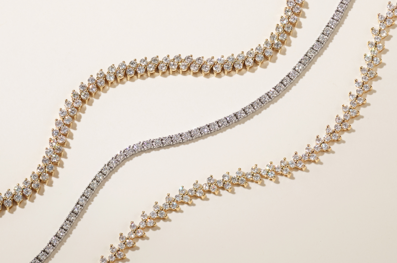 Glacier Double Row 4 tcw Diamond Bracelet (7 in) This stunning bracelet features two staggered rows of natural diamonds for a luxe look. Crafted in warm 14-karat yellow gold, the diamonds are hand-matched for consistent sparkle and beauty. 5 tcw Diamond Tennis Necklace Add sparkle to any look with this natural diamond tennis necklace. Crafted in bright 14-karat white gold, the diamonds are hand-matched for consistent beauty. A secure box clasp with a figure-eight safety latch offers worry-free wear. Holly 3 tcw Diamond Tennis Bracelet (7 in) Trios of natural diamonds form a beautiful, sparkling pattern along this 14-karat yellow gold tennis bracelet. A secure box clasp and figure-eight safety latch offer worry-free wear.