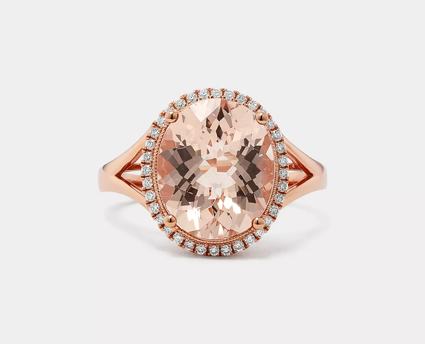 Rosita Morganite & Diamond Halo Ring
Steal the show with this stunning natural morganite cocktail ring. A halo of natural diamonds beautifully highlights the morganite gemstone. Crafted in vivid 14-karat rose gold, it features ornate touches, with delicate milgrain detailing in the halo and around the sides.