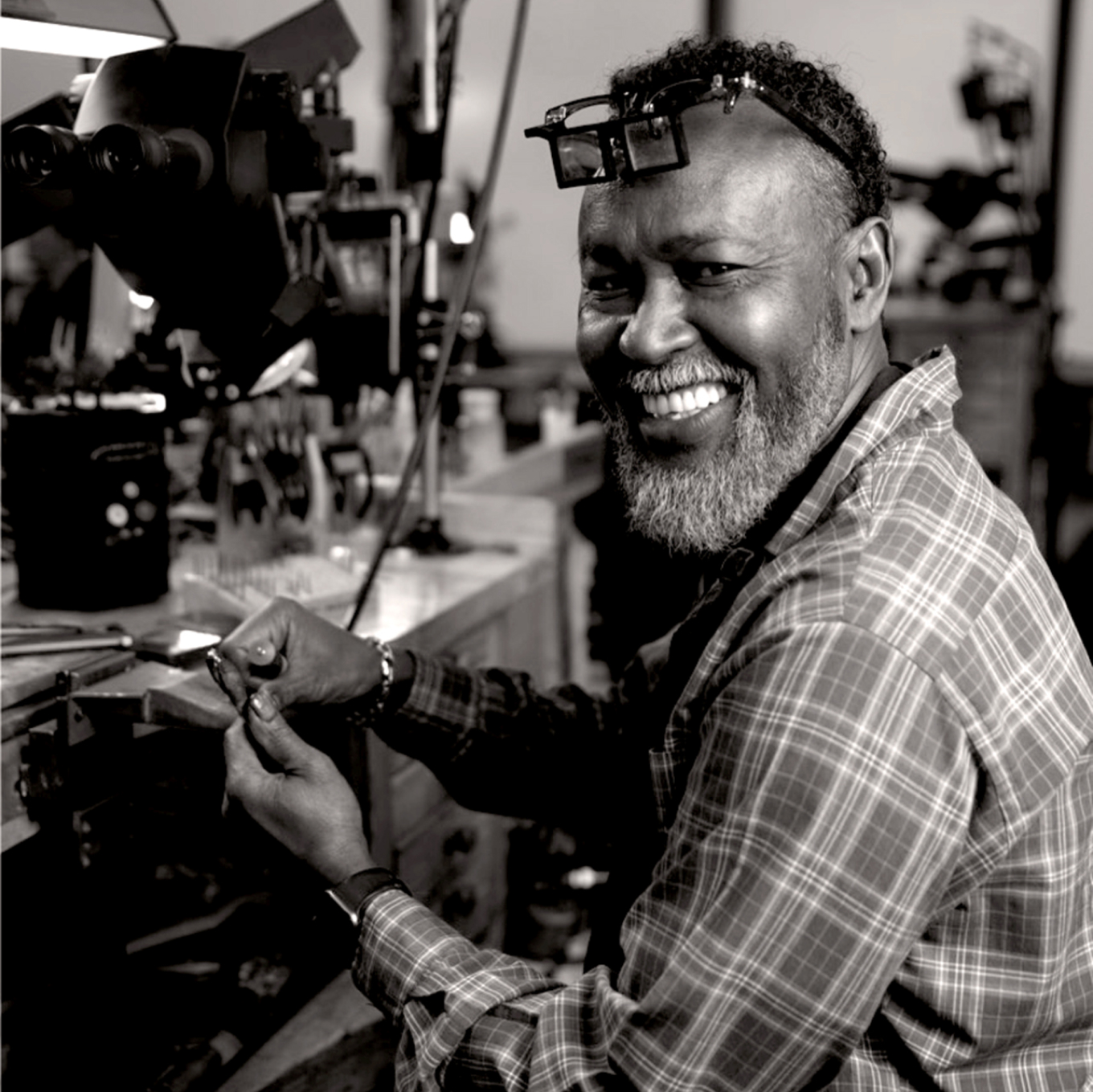 jeweler hand finishing jewelry