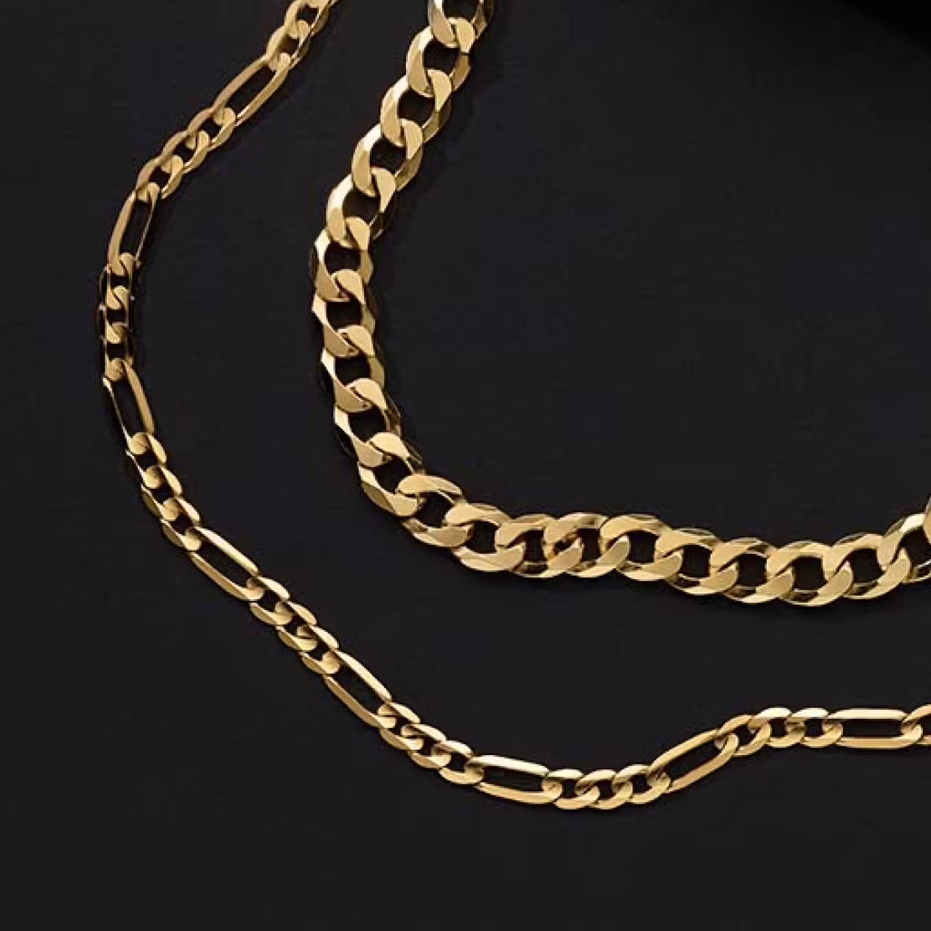 two gold chains. 24in 14K Yellow Gold Figaro Chain (3.8mm) Easily elevate any look with this stylish Figaro chain. Crafted in warm 14-karat yellow gold, a secure lobster clasp offers worry-free wear. Approx. 3.8mm width 24-inch Figaro chain Lobster clasp 14k yellow gold 22 in 14K Yellow Gold Vermeil Curb Chain (6.4mm) This chic curb chain is a simple way to dress up any look. It’s crafted in quality 14-karat yellow gold vermeil (pronounced ver-may), which features a thick layer of 14-karat gold plating on sterling silver. A secure lobster clasp offers worry-free wear. Approx. 6.4mm width 22-inch curb chain Lobster clasp Vermeil 14k yellow gold