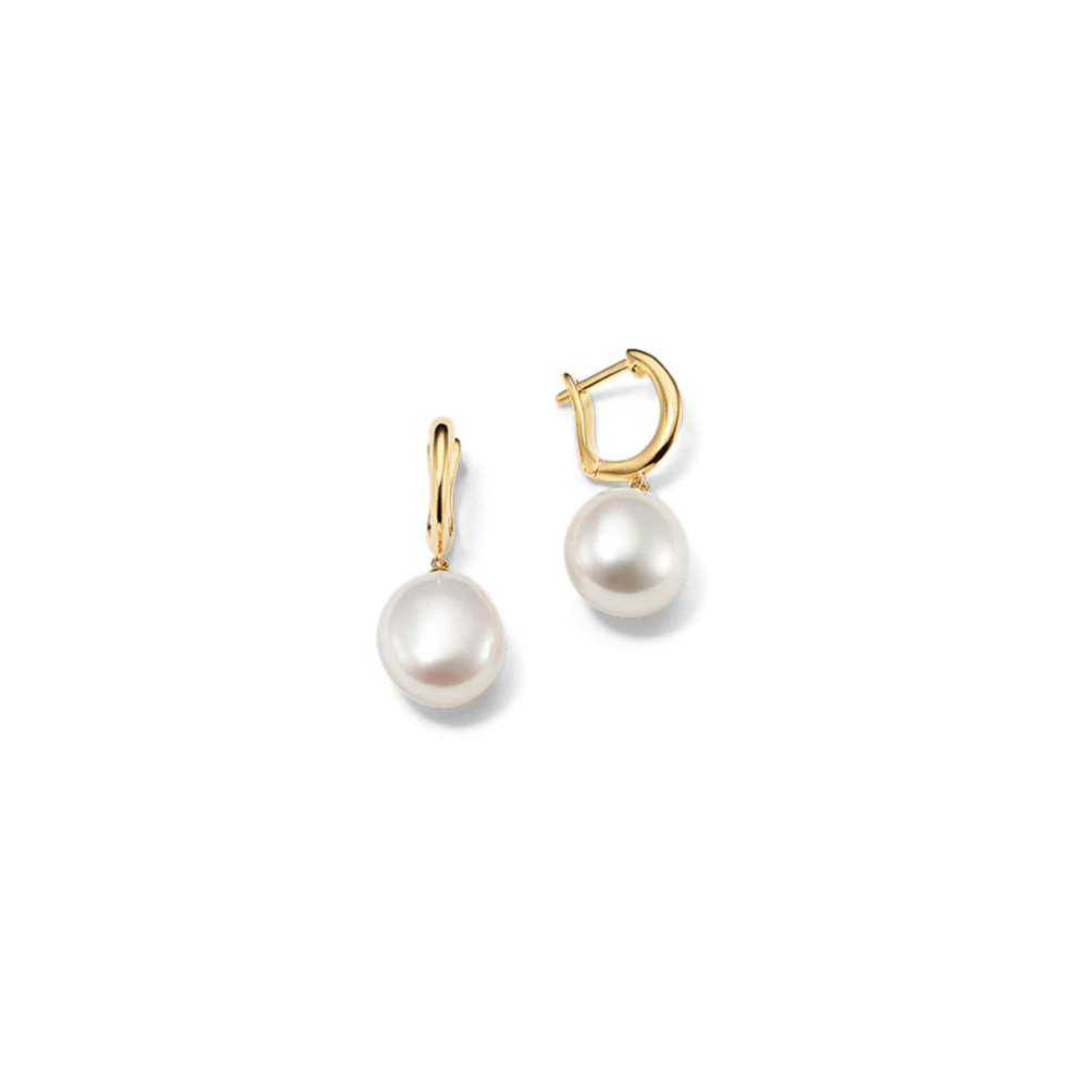 Baroque Cultured Freshwater Pearl Vermeil Hoops Perfect for a June birthday or any pearl lover, these simple and sophisticated charm hoops each feature a baroque cultured freshwater pearl. They’re crafted in quality 14-karat yellow gold vermeil (pronounced ver-may), which features a thick layer of 14-karat gold plating on sterling silver. Each pair of hand-matched pearls is unique and will vary slightly from the images shown. 2 baroque cultured freshwater pearls at 8-8.5mm Dangle design Approx. 7/8-inch length Latch back 14k yellow gold vermeil