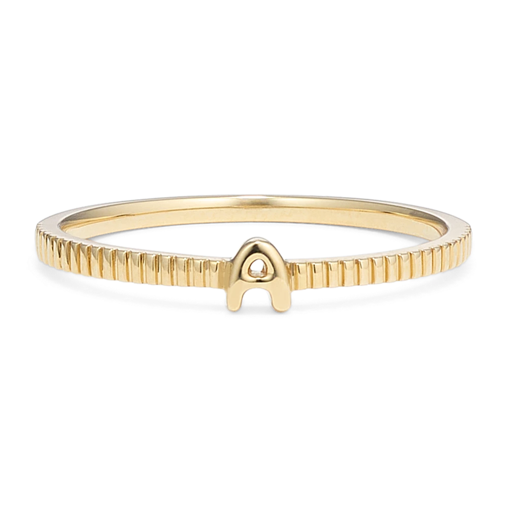 Letter A Fluted 14K Yellow Gold Ring Personalize any ring stack with this 14-karat yellow gold letter ring, featuring an A in the center and a beautiful fluted band. It’s available in letters A-Z, so you can find one that’s unique to you and your style. Whether opting for a first or last initial, it also makes the perfect personal gift. 14k yellow gold Approx. 1.5mm band width Engravable and resizable